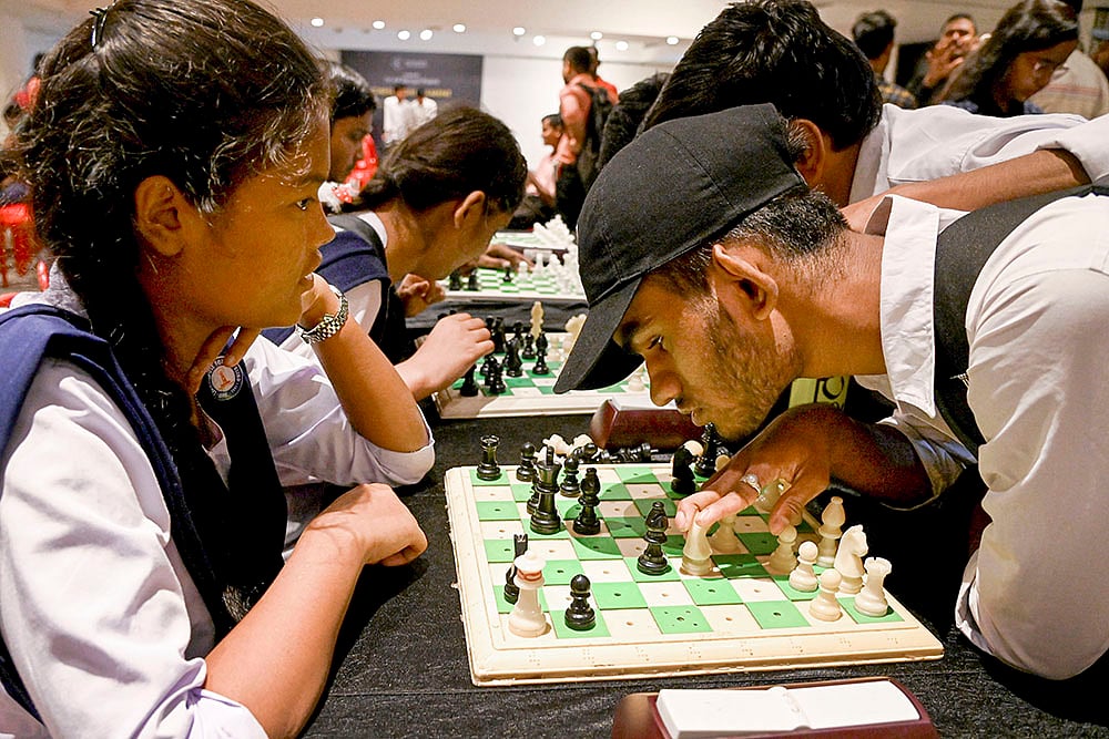 Visually impaired students play chess on International Chess Day in Kolkata