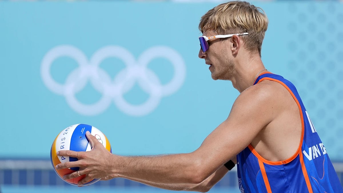 AP : Steven van de Velde in action at the Paris Olympic Games 2024 volleyball match.