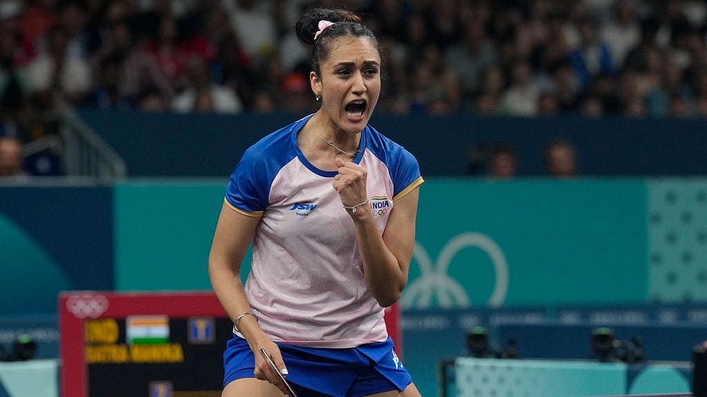 India's Manika Batra reacts after a winning point against France's Prithika Pavade during a women's singles round of 32 table tennis game. - AP