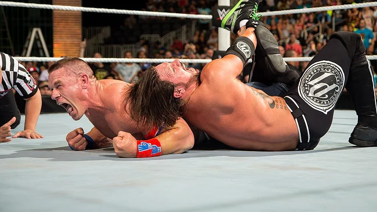 John Cena and AJ Styles. - WWE