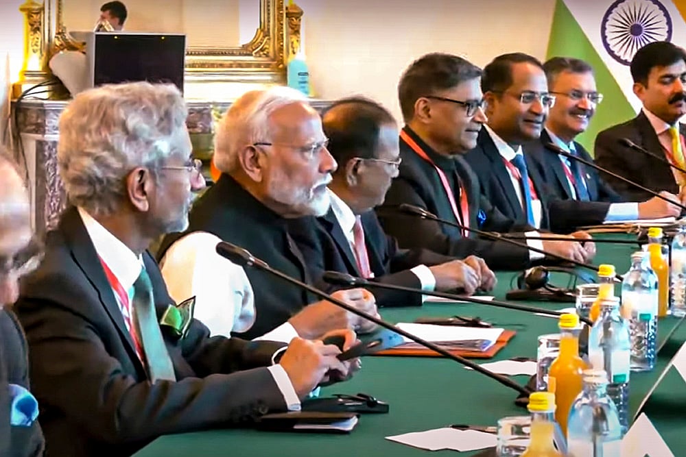Narendra Modi, S Jaishankar and Ajit Doval  during a delegation level meeting in Austria