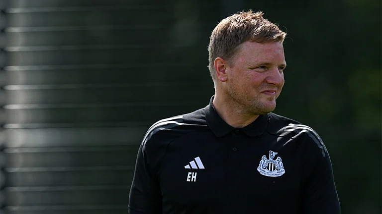 Eddie Howe has said he is committed to the Newcastle job amid links to vacant England role - null