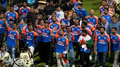 The triumphant Indian men's cricket team with the T20 World Cup trophy at Wankhede Stadium on Thursday (July 4).