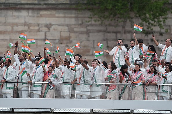 Getty Images : Athletes of Team India are seen on a boat along the River Seine during the opening ceremony of the Olympic Games Paris 2024