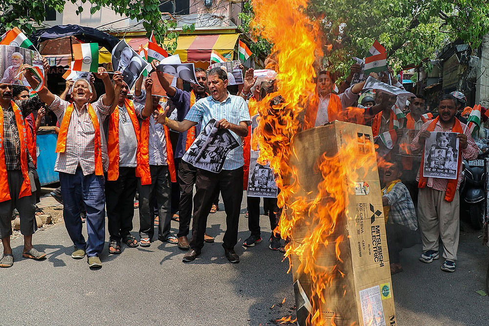 Photo: PTI : Protest after soldiers killed in Doda