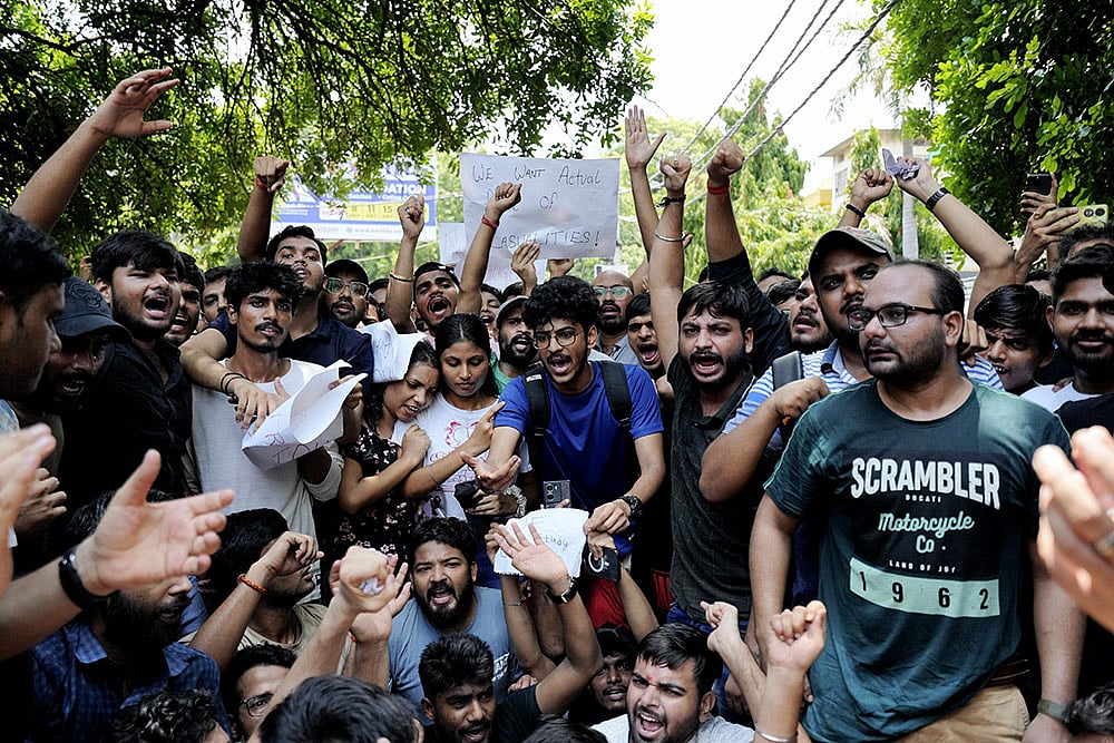 Protests after students drown in Delhi building basement | - Photo: PTI/Kamal Singh