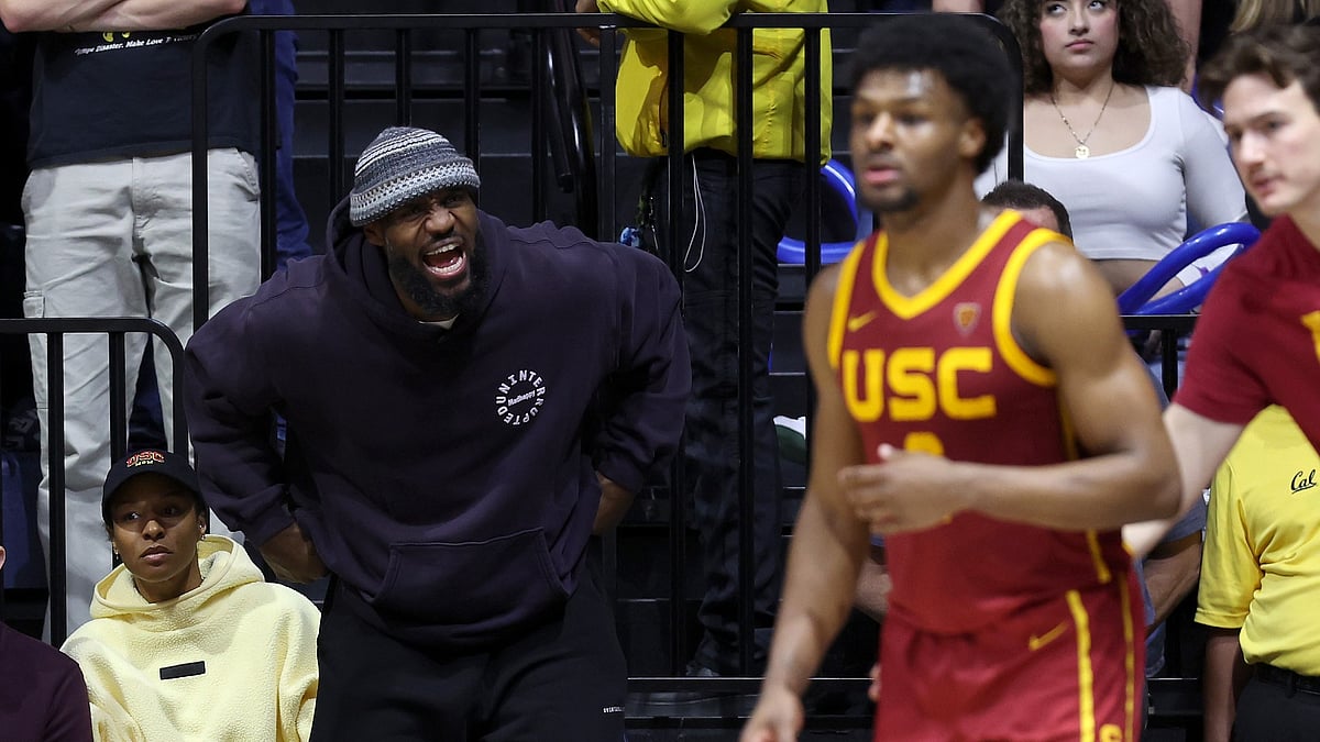 LeBron James urges on his son, Bronny. - null
