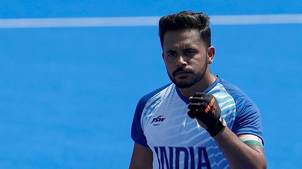 India's Harmanpreet Singh, center, celebrates after scoring a goal during the men's field hockey match between India and Argentina at the Yves-du-Manoir Stadium, at the 2024 Summer Olympics, Monday, July 29, 2024, in Colombes, France. - AP/Anjum Naveed