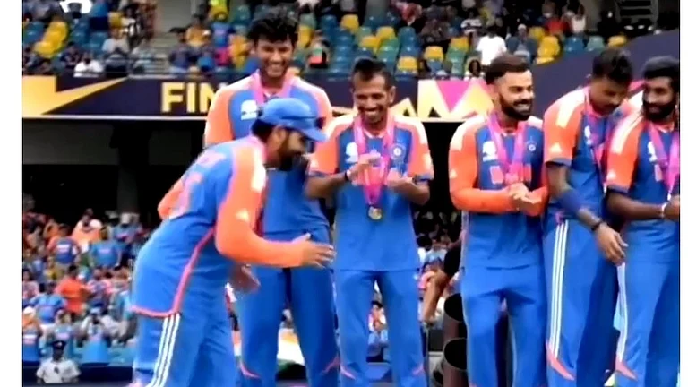Rohit Sharma does the strut. - X