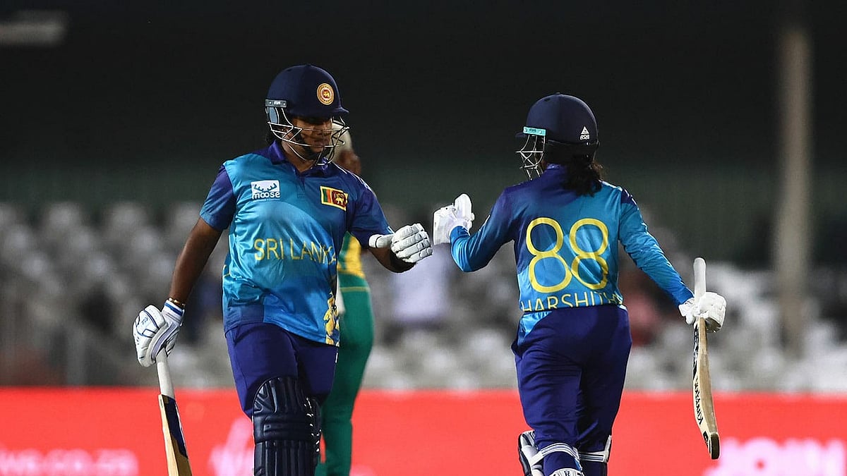 Photo: X/ @CricinfoHindi : Sri Lanka women batter Vishmi Gunaratne (L) and Harshitha Samarawickrama at the crease during the match against Bangladesh.