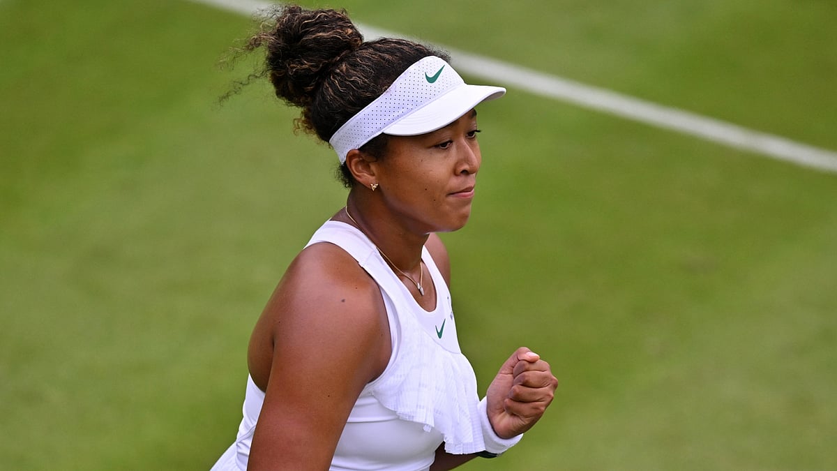 Naomi Osaka celebrates