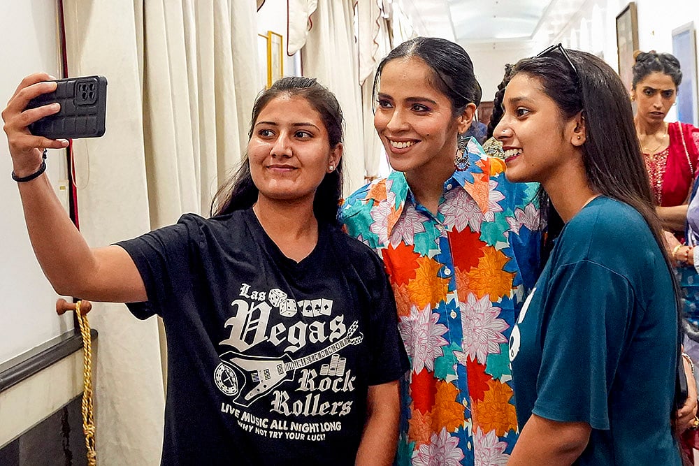 Fans take a selfie with badminton player Saina Nehwal 