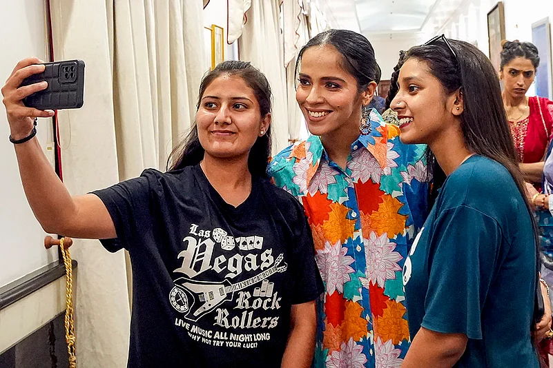 Fans take a selfie with badminton player Saina Nehwal