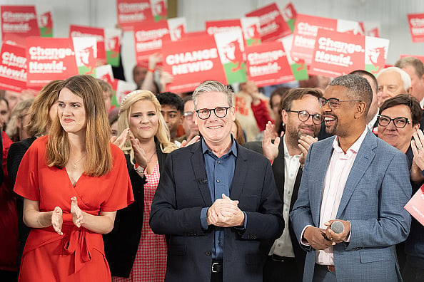 Getty Images : Labour Party leader Sir Keir Starmer with First Minister of Wales Vaughan Gething (right) and local parliamentary candidate for Carmarthenshire, Martha O'Neil, addresses supporters on the final day of election campaigning, Wednesday, July 3, 2024. 