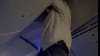 Jheelam : A man being taken down from the flight's overhead bin