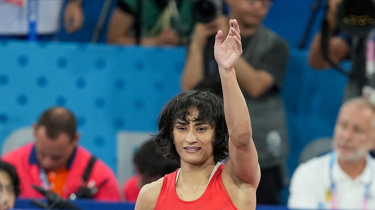 PTI Photo/Ravi Choudhary : India's Vinesh Phogat celebrates after winning her Women's Freestyle 50kg semi-final wrestling match against Cuba's Yusneylys Guzman Lopez at the 2024 Summer Olympics.