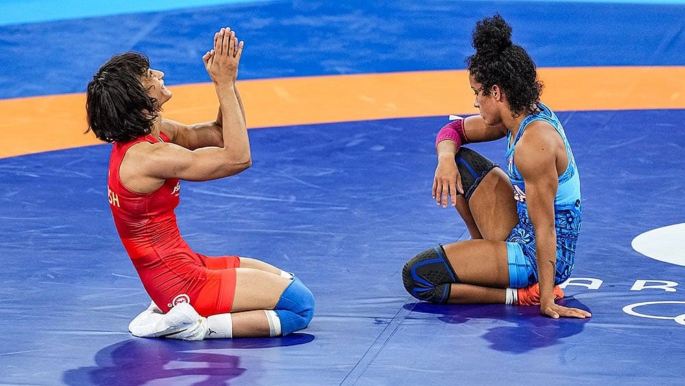 India's Vinesh Phogat celebrates after sealing a spot in the final. - Photo: PTI/Ravi Choudhary