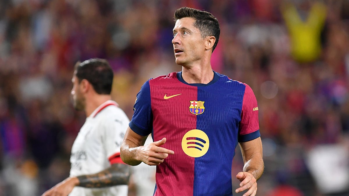 Robert Lewandowski scored twice against Milan - null