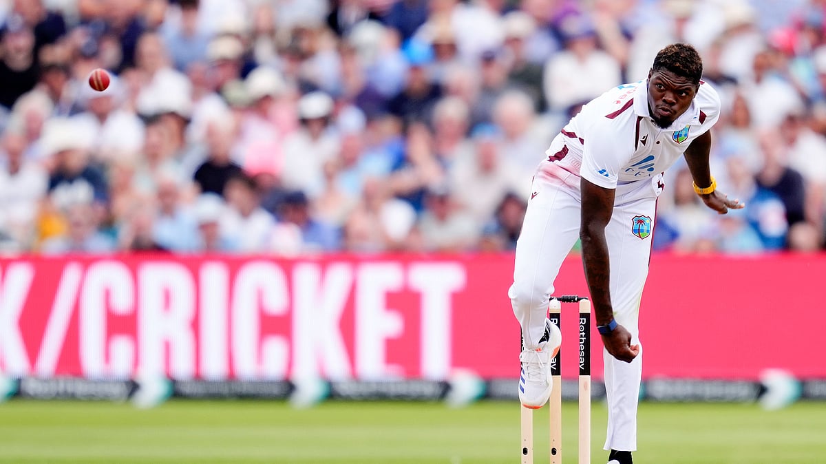 Nick Potts/PA via AP : West Indies' Alzarri Joseph bowling during day two of the Third Rothesay Test match at Edgbaston, Birmingham, England.