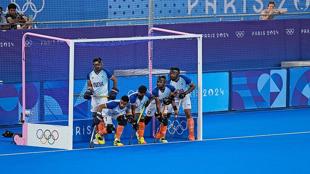 Photo: AP/Aijaz Rahi : Paris Olympics 2024 Hockey: India men's hockey team in action.