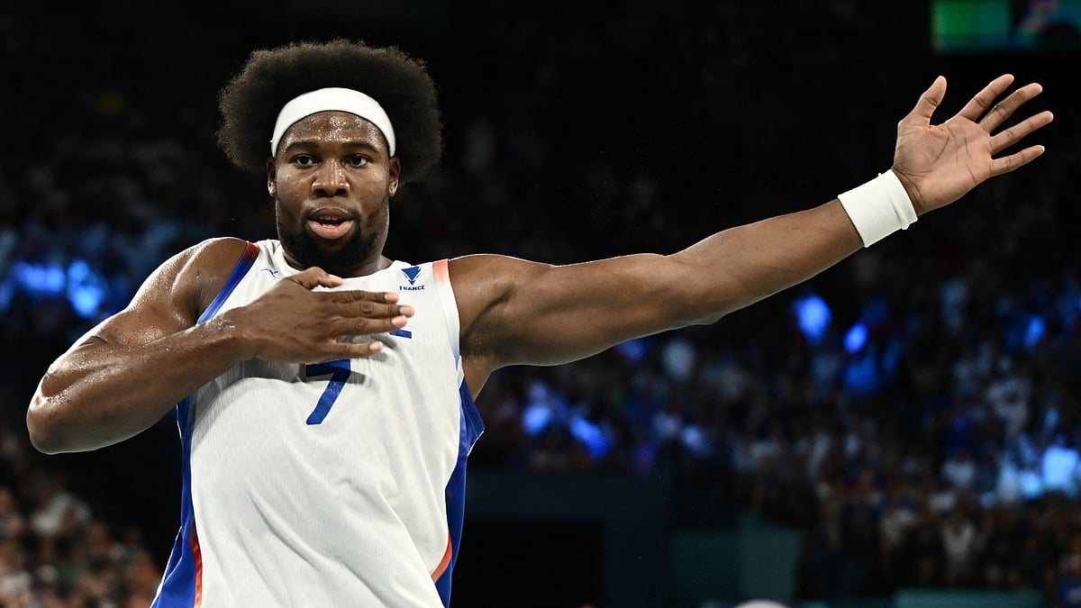 Guerschon Yabusele celebrates during France's triumph over Germany at the Paris Olympics - null