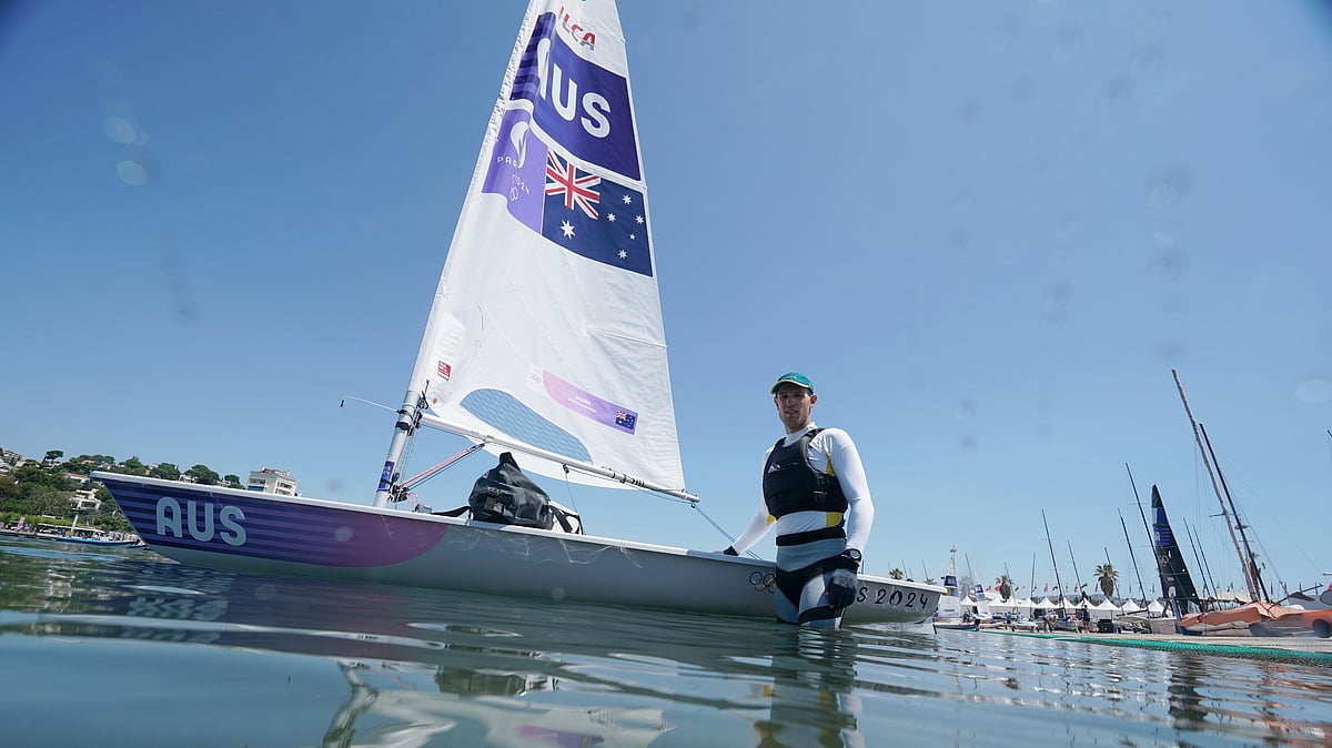 AP Photo/Jacquelyn Martin : Matt Wearn, of Australia, poses for a portrait before men's dinghy practice at the 2024 Summer Olympics.