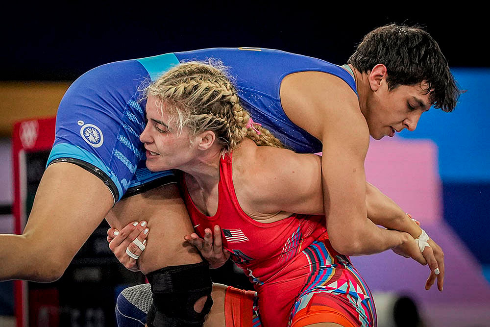 Indias Anshu competes with USAs Helen Maroulis during womens freestyle 57kg wrestling