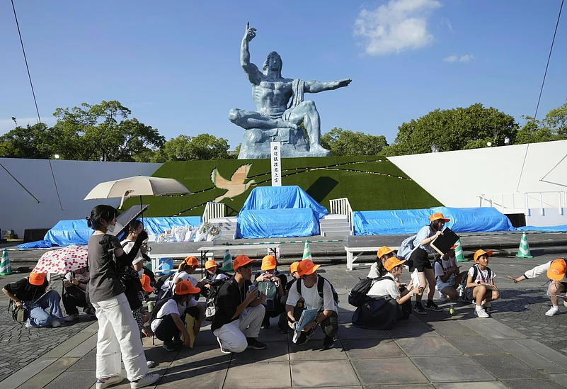 Peace Park visitors crouch after earthquake alert on Thursday |