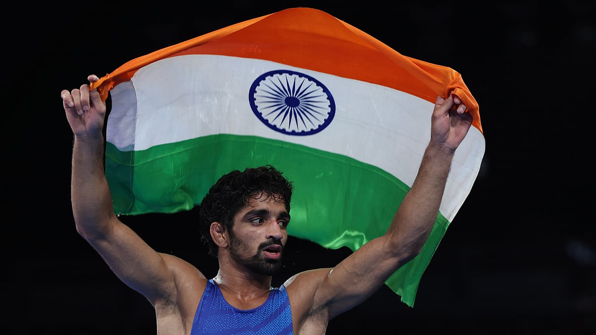 India's Aman Sehrawat celebrates after clinching the men's freestyle wrestling 57kg bronze medal at the Paris Olympics. - PTI