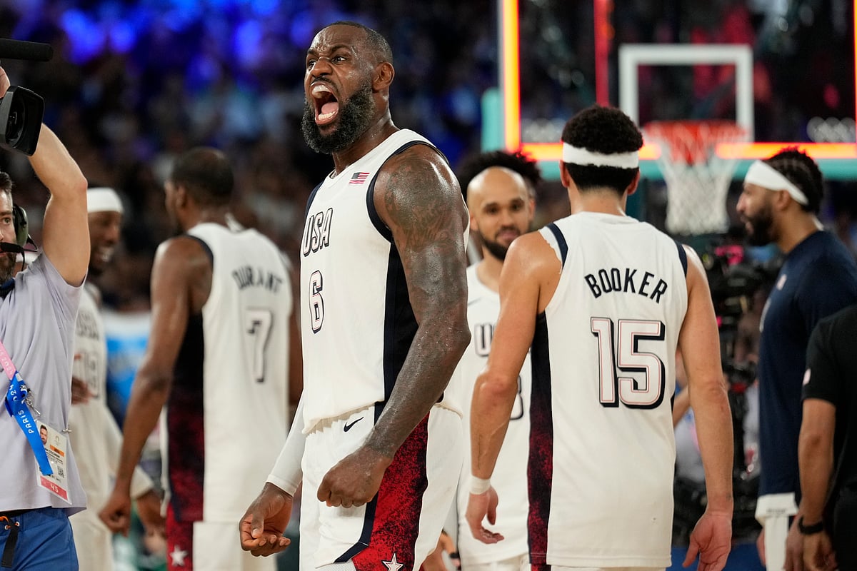  (AP Photo/Mark J. Terrill) : United States' LeBron James (6) celebrates after beating Serbia during a men's semifinals basketball game at Bercy Arena at the 2024 Summer Olympics, Thursday, Aug. 8, 2024, in Paris, France.