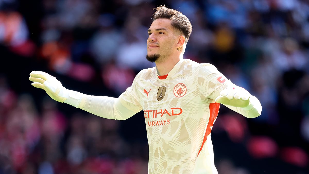 Ederson celebrates after scoring a penalty in Manchester City's Community Shield win.