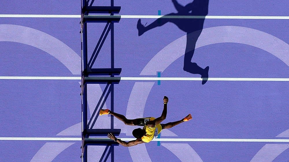 Men's 400-meter hurdles heat - | Photo: AP/David J. Phillip