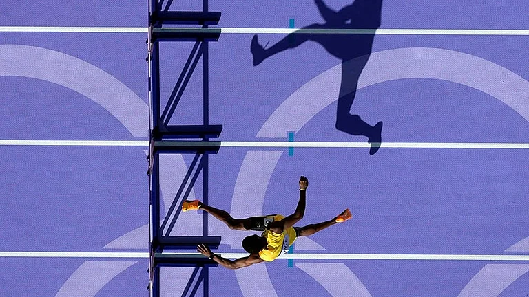 Men's 400-meter hurdles heat - | Photo: AP/David J. Phillip