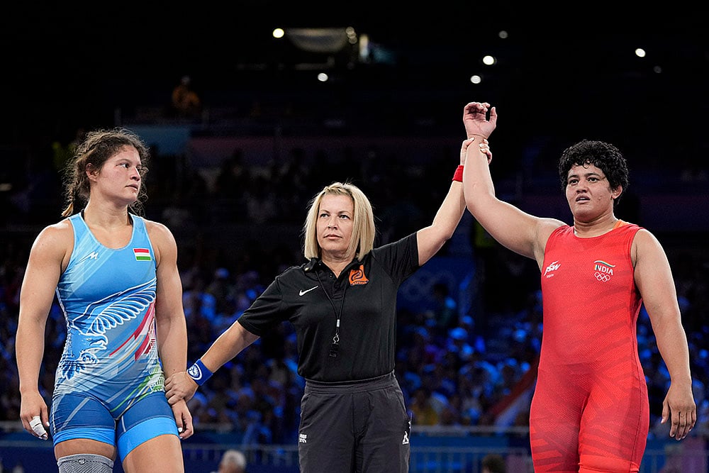 Reetika reacts after womens freestyle wrestling 76kg pre-quarterfinal against Bernadett Nagy