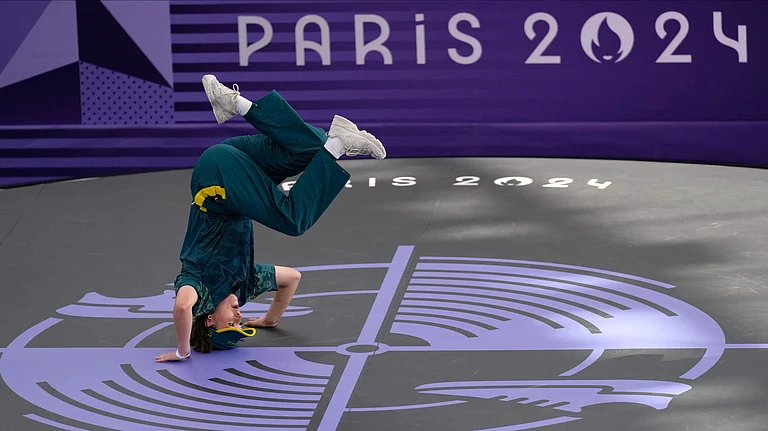 Australia's Rachael Gunn, known as B-Girl Raygun, competes during the Round Robin Battle at the breaking competition at La Concorde Urban Park at the 2024 Summer Olympics, Friday, Aug. 9, 2024, in Paris, France. - AP Photo/Abbie Parr