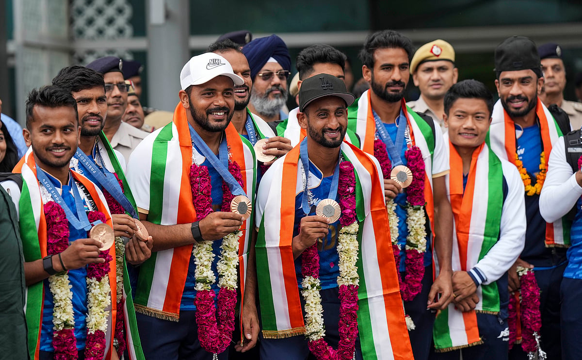India national hockey team at Delhi Airport.
