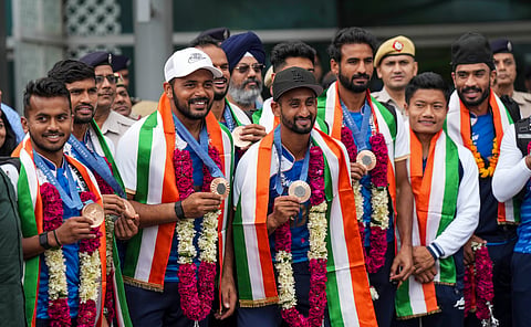 India national hockey team at Delhi Airport.