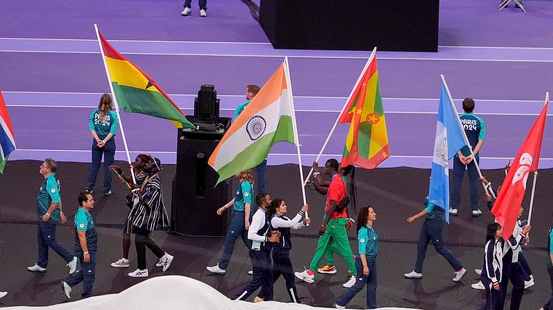 Indias flag-bearers shooter Manu Bhaker and mens hockey team goalkeeper PR Srejeesh. PTI