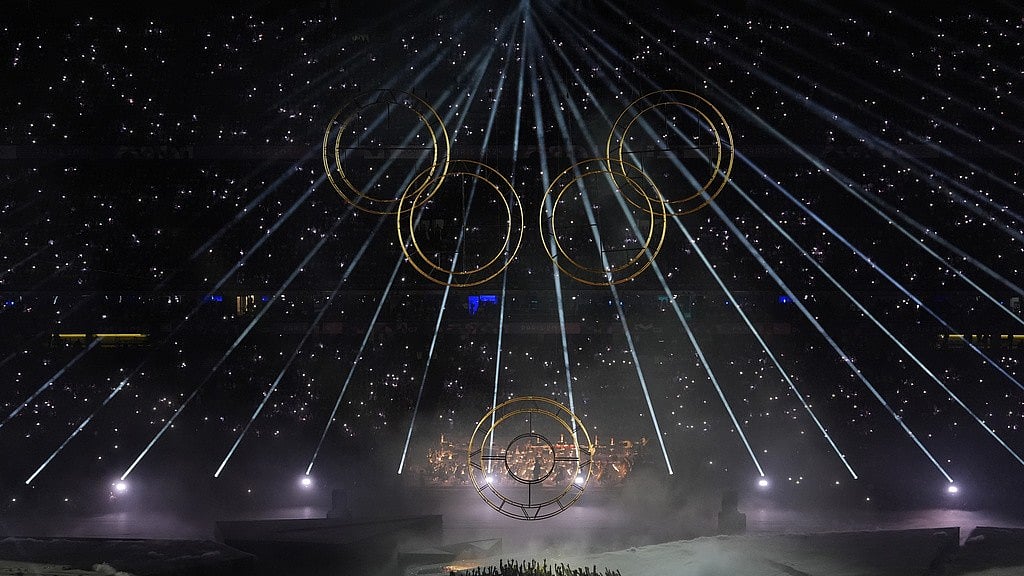 AP : Artists perform during the 2024 Paris Olympics closing ceremony at the Stade de France on Sunday, August 11.