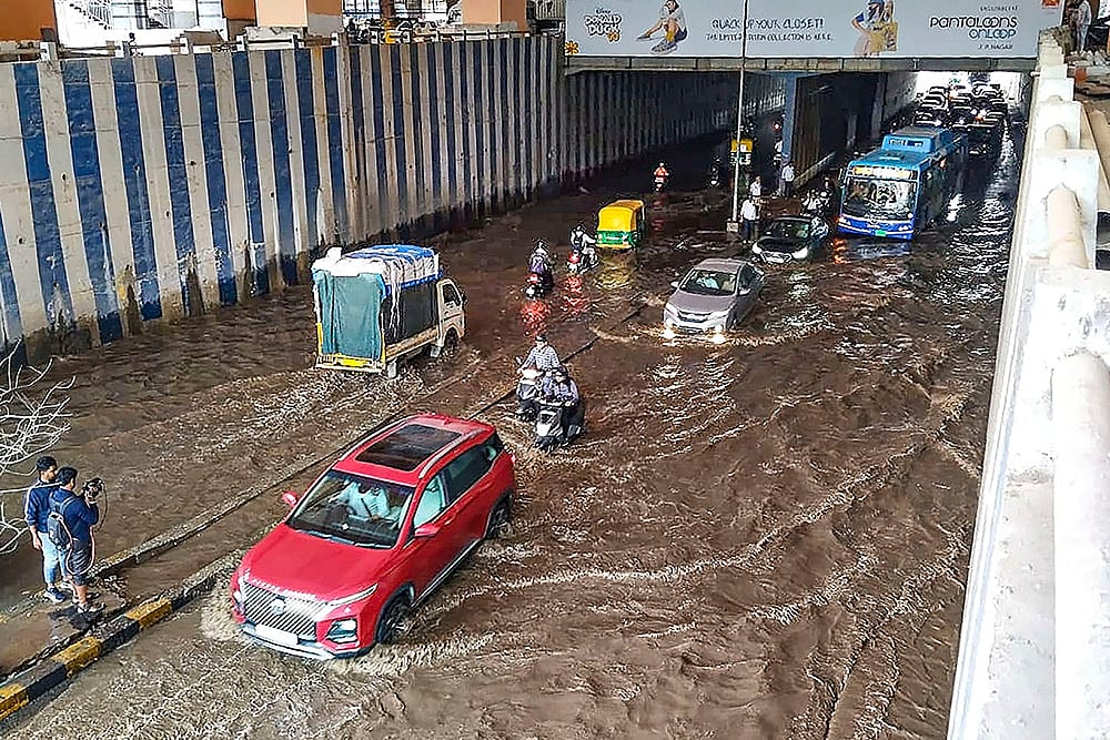  waterlogged underpass near Jayadeva Hospital after heavy rainfall, in Bengaluru