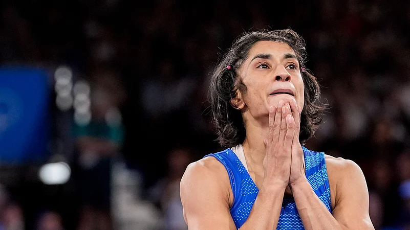Vinesh Phogat reacts after the round of 16 bout. AP Photo