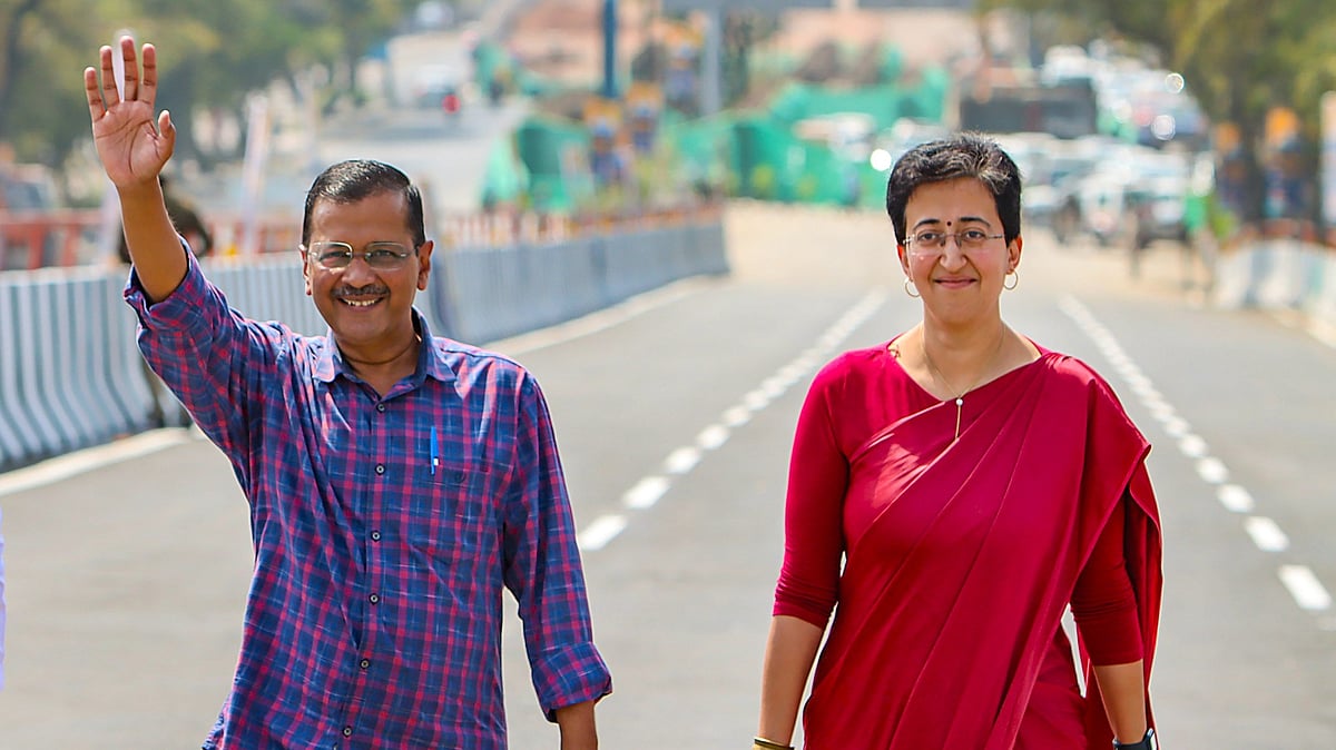 Delhi Chief Minister Arvind Kejriwal with state Cabinet Minister Atishi