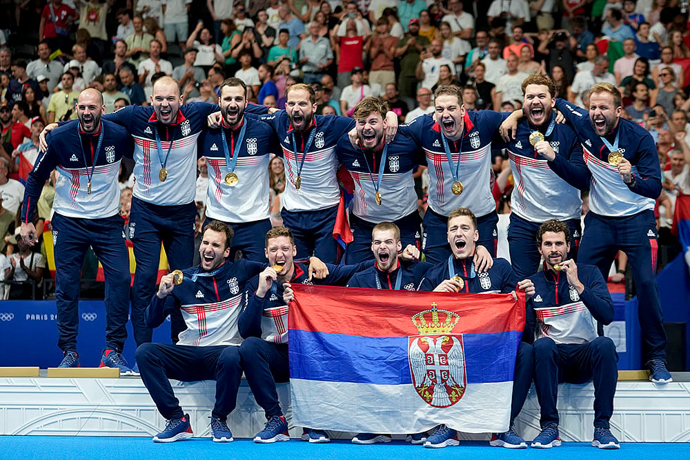 2024 Paris Olympics water polo medalists_ Serbias team celebrate after winning gold