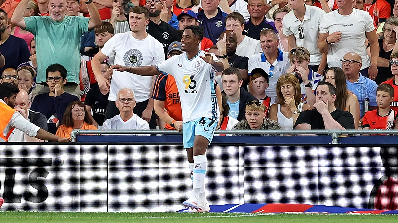 Wilson Odobert celebrates after scoring Burnleys second goal versus Luton Town