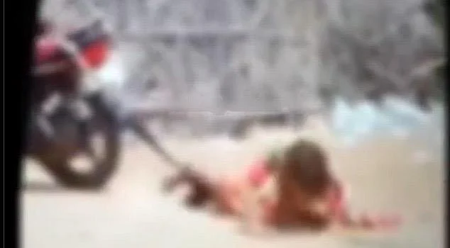 Woman getting dragged by her husband in Rajasthan