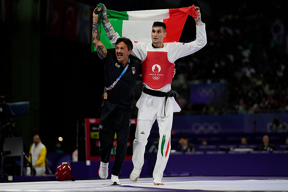 2024 Paris Olympics Taekwondo Medallists_mens 80kg_Italys Simone Alessio celebrates Silver