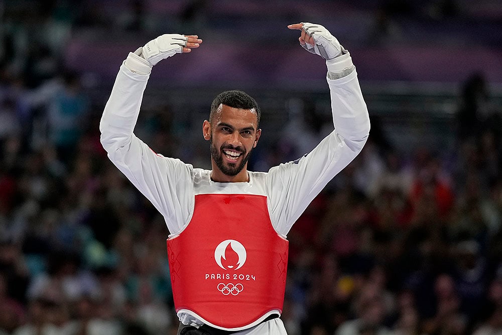 2024 Paris Olympics Taekwondo Medallists_mens 80kg_Tunisias Firas Katoussi celebrates  gold