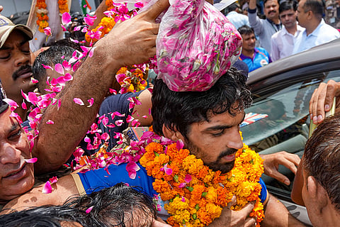 Aman Sehrawat arrives at Delhi airport