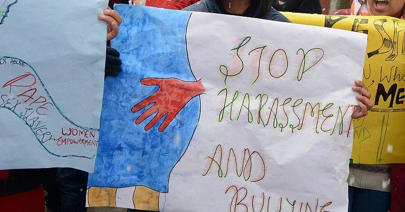 A poster with a slogan against harassment of women