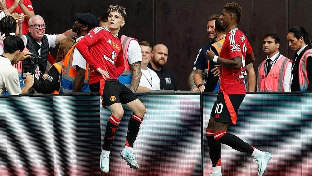 Manchester United forward Alejandro Garnacho (left) celebrates a goal in the FA Community Shield. - Photo: AP/David Cliff